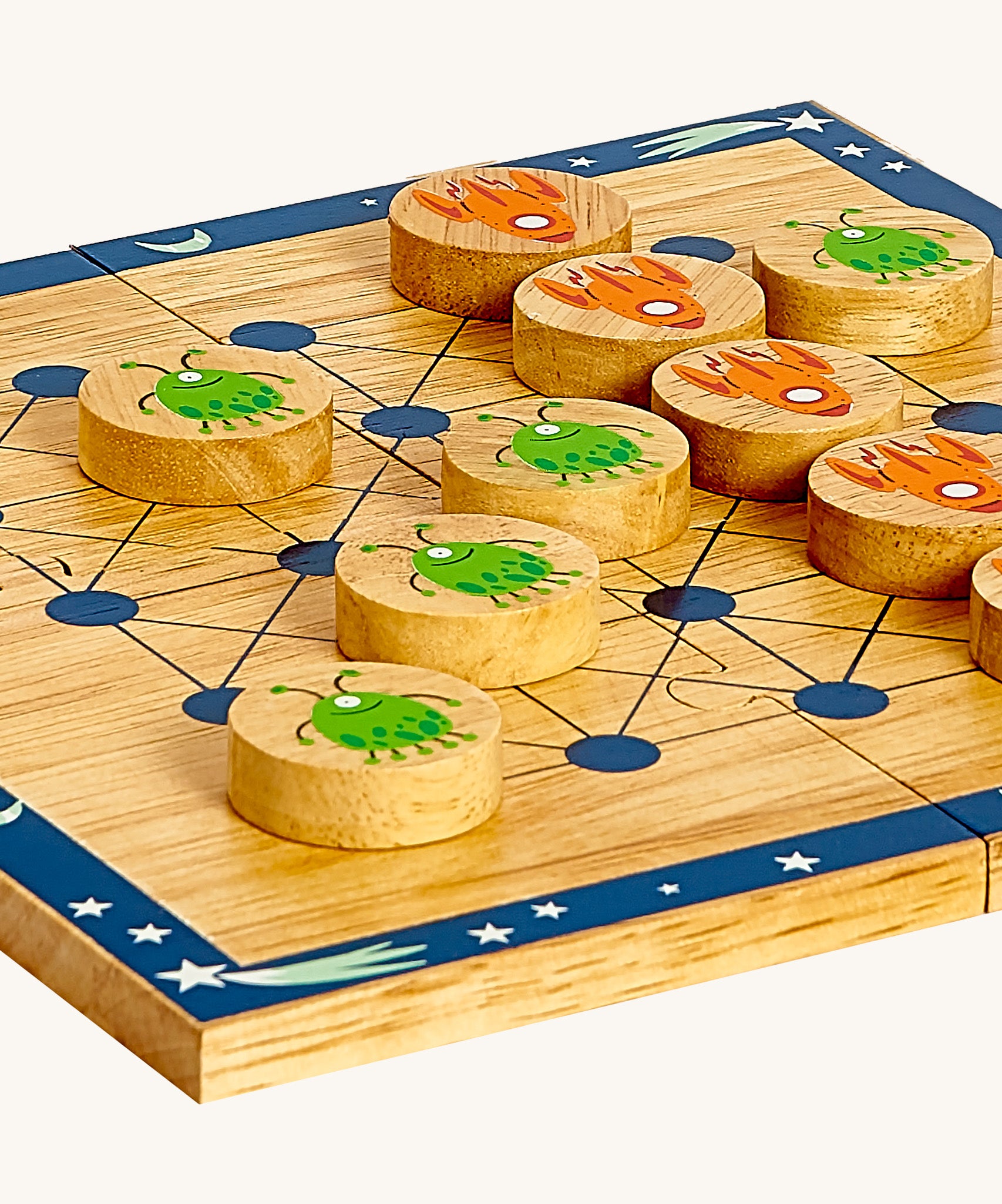 A close up of the Lanka Kade cosmic wooden board game showing the circular counter detail and thickness of the board and counters