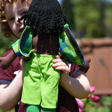 A close up of the back of the Lanka Kade Rag Doll Dad with Black Skin, Black Hair. The back of teh t-shirt s shown open.