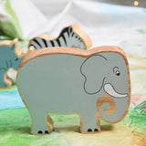 A Lanka Kade grey elephant wooden toy figure placed on a Wonderie plains of Africa play cloth. These wooden toy figures are part of a huge range of Lanka Kade fair trade, wooden toys available here at Babipur.