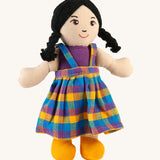 A Lanka Kade Asian Girl Doll with White Skin and Black Hair.