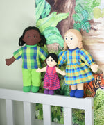 Lanka Kade Rag Doll family, Mum with White Skin and  Blonde Hair, girl with black hair and white skin and dad with black skin and black hair.