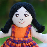 A close up of the face on the Lanka Kade Girl Doll with White Skin and Black Hair.