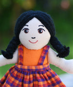 A close up of the face on the Lanka Kade Girl Doll with White Skin and Black Hair.