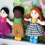 A line up of Lanka Kade fair trade girl and boy rag dolls. 