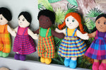 A line up of Lanka Kade fair trade girl and boy rag dolls. 
