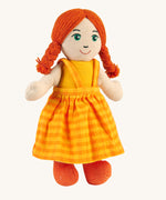 A Lanka Kade Girl Doll with White Skin and Red Hair.. The colour of the dolls outfit will vary.