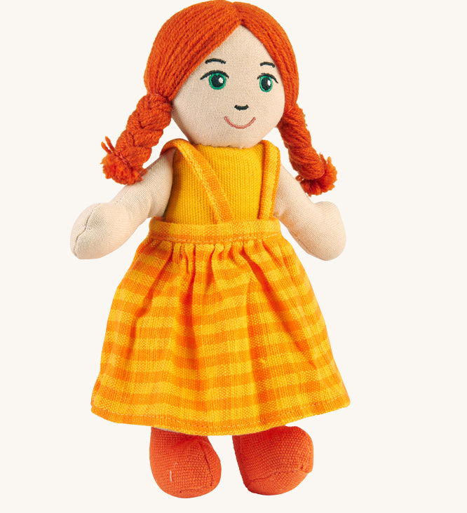 A Lanka Kade Girl Doll with White Skin and Red Hair.. The colour of the dolls outfit will vary.