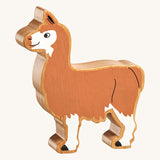 A Lanka Kade brown and white Llama wooden toy figure. These wooden toy figures are part of a huge range of Lanka Kade fair trade, wooden toys available here at Babipur.