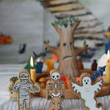 Lanka Kade mummy, skeleton and ghost figures placed in front of a Halloween themed celebration ring set up.