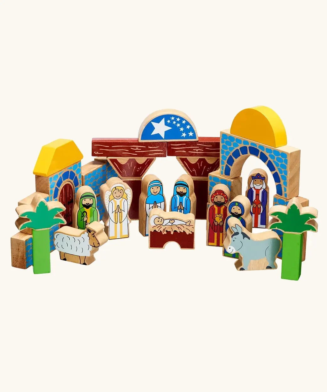 A wooden toy Lanka Kade nativity featuring painted blocks, arches, stable, palm trees, animals, and figures representing the Holy Family, Wise Men, and shepherds.