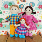 A Lanka Kade Rag Doll Mum with White Skin, Black Hair with Dad with white skin and blond hair and a girl doll with white skin and red hair. 