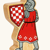 Lanka Kade red foot knight with sword wooden toy figure.