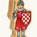 Lanka Kade red front facing knight wooden toy figure. 