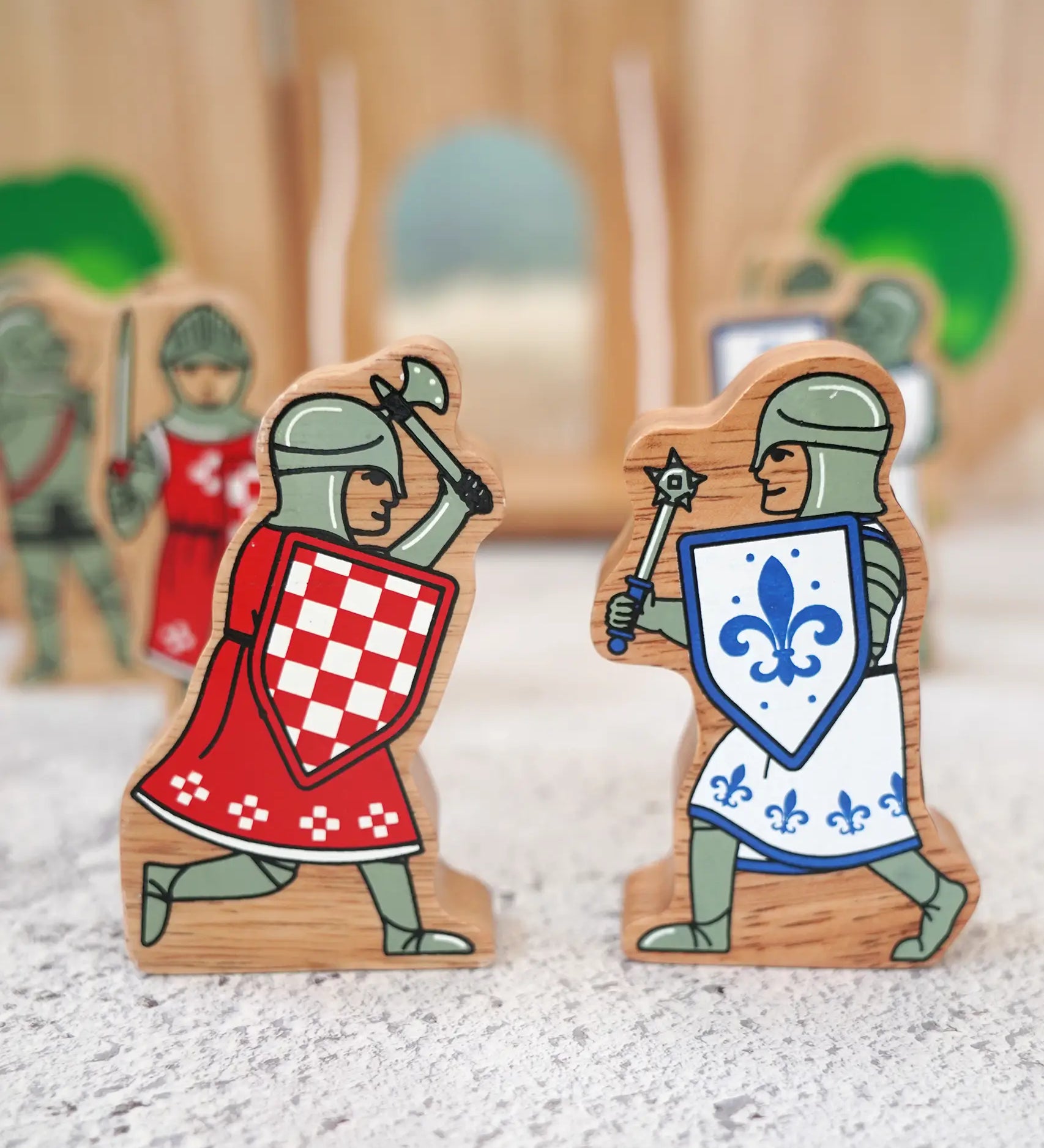 Lanka Kade red foot knight with battle axe wooden figure standing next to a blue knight with morning star weapon fifure
