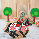 Lanka Kade wooden red knight on horseback figure with a castle and trees figures in the background