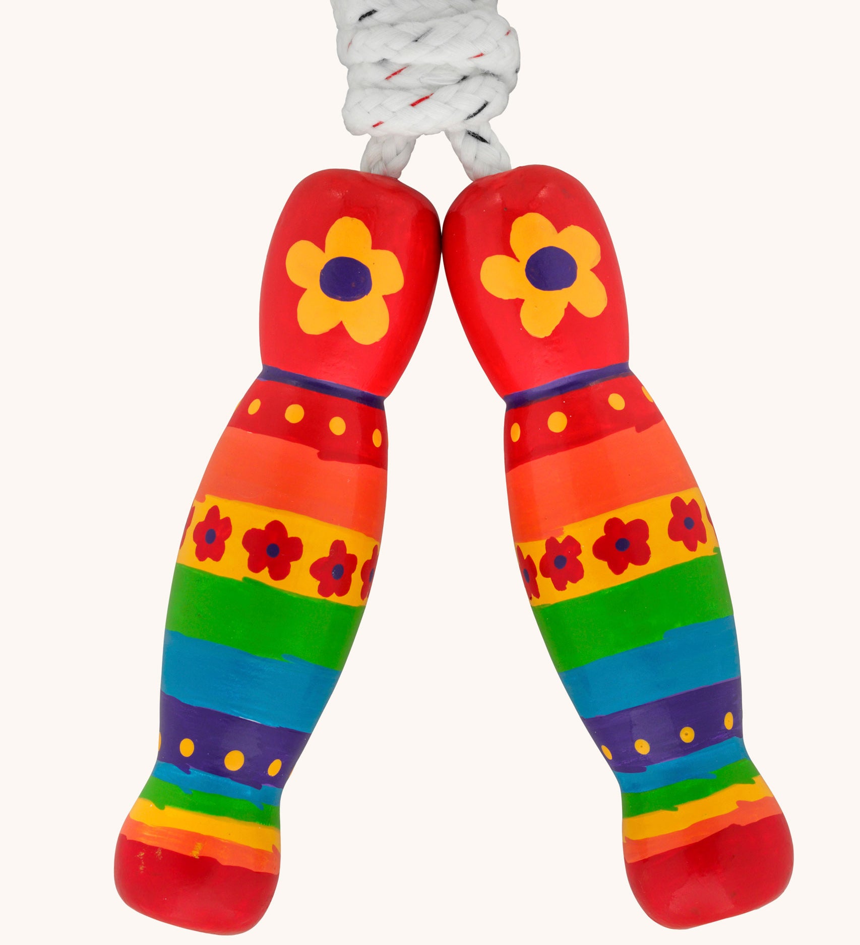 Red rainbow and flowers design Lanka Kade wooden handled children's skipping rope. We are proud stockist of Lanka Kade's range or fair trade wooden toys here at Babipur. 