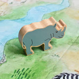 A Lanka Kade Grey Rhino Wooden Wild Animal Figure placed on a Wonderie Plains of Africa play cloth. These wooden toy figures are part of a huge range of Lanka Kade fair trade, wooden toys available here at Babipur.