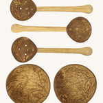 Lanka Kade coconut water play set. Comes with 2 coconut bowls with holes on the bottom and 3 coconut spoons with holes through them.