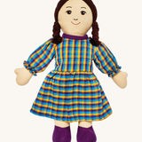 Lanka Kade mum doll with white skin and long black hair. Features a long dress in a multicoloured check style and stitched on shoes. 