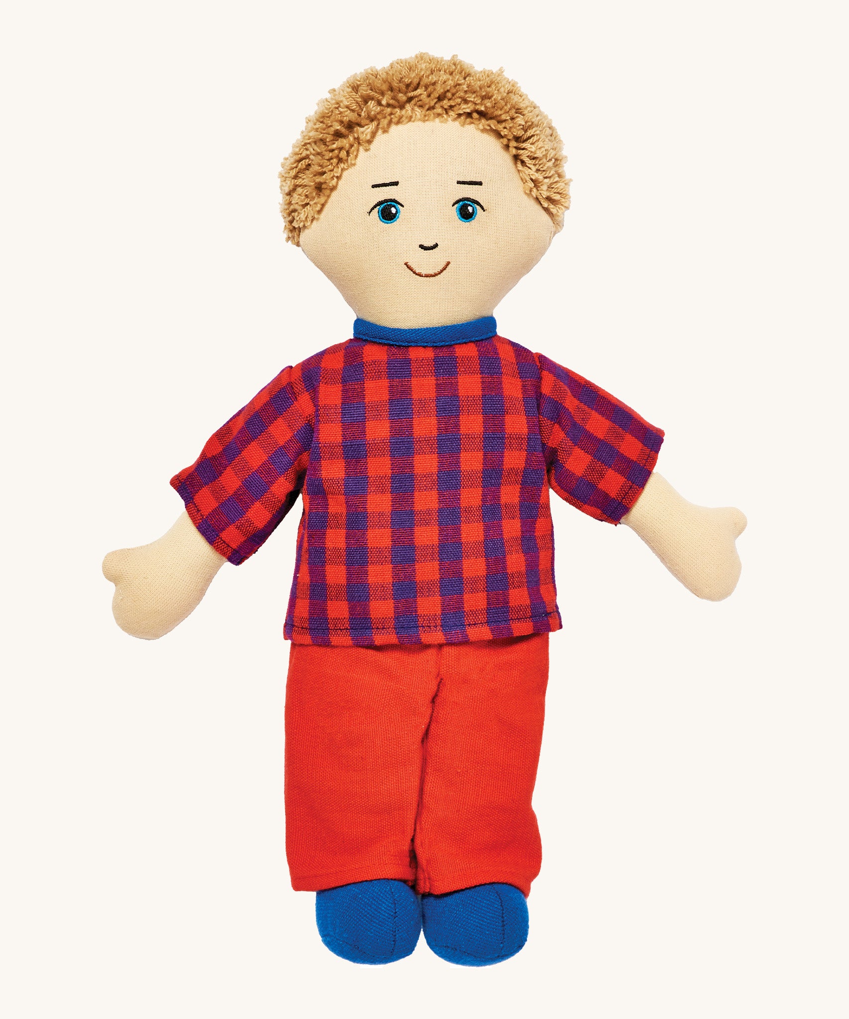 Lanka Kade dad doll with white skin and short blonde hair. Features a short sleeve top in a multicoloured check style, coloured trousers and stitched on shoes. 