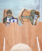 Lanka Kade wooden blue armoured knight archer standing next to a standing knight figure on top of a wooden castle