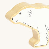 A close up of the chunky wooden Lanka Kade polar bear animal figure showing it's facial features and fur detail. Ths figure is available at Babipur.