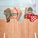 Lanka Kade wooden red armoured knight archer standing next to a standing knight figure on top of a wooden castle