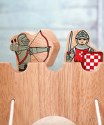 Lanka Kade wooden red armoured knight archer standing next to a standing knight figure on top of a wooden castle