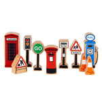 Pieces from the Lanka Kade plastic-free wooden toy town playset lined up on a white background