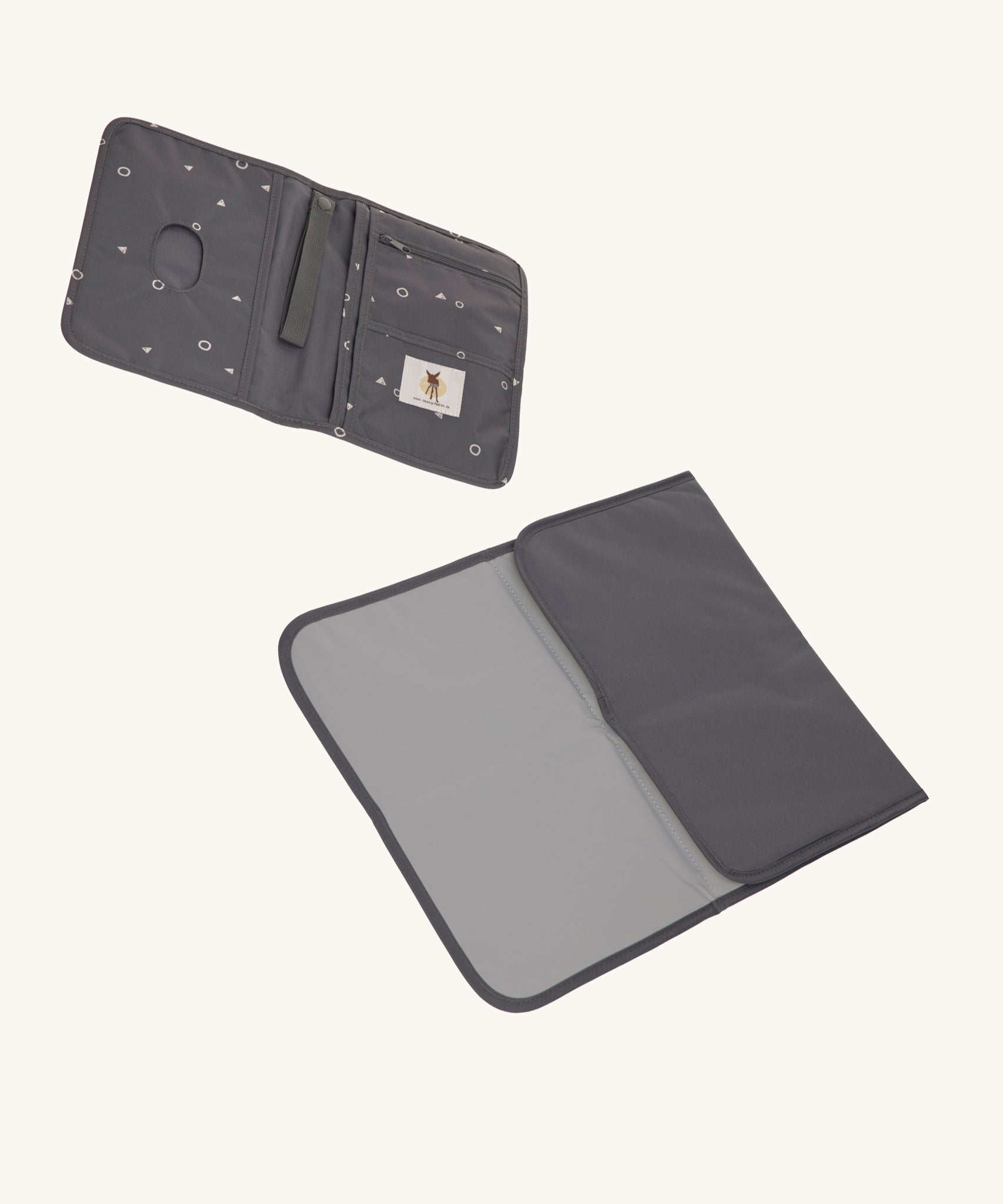 The Lassig recycled polyester baby change pouch in a dark anthracite grey, and the change mat that comes with it.