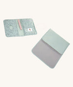 The Lassig baby changing pouch made from 100% recycled polyester, in a floral mint green pattern., with the matching baby change mat.
