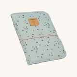 The Lassig baby changing pouch made from 100% recycled polyester, in a floral mint green pattern.