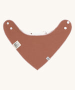The reverse side of the Lassig organic cotton bandana bib, in a lovely orange rust colour. 