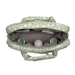 A top view of inside the Lassig every day change nappy bag in light khaki.