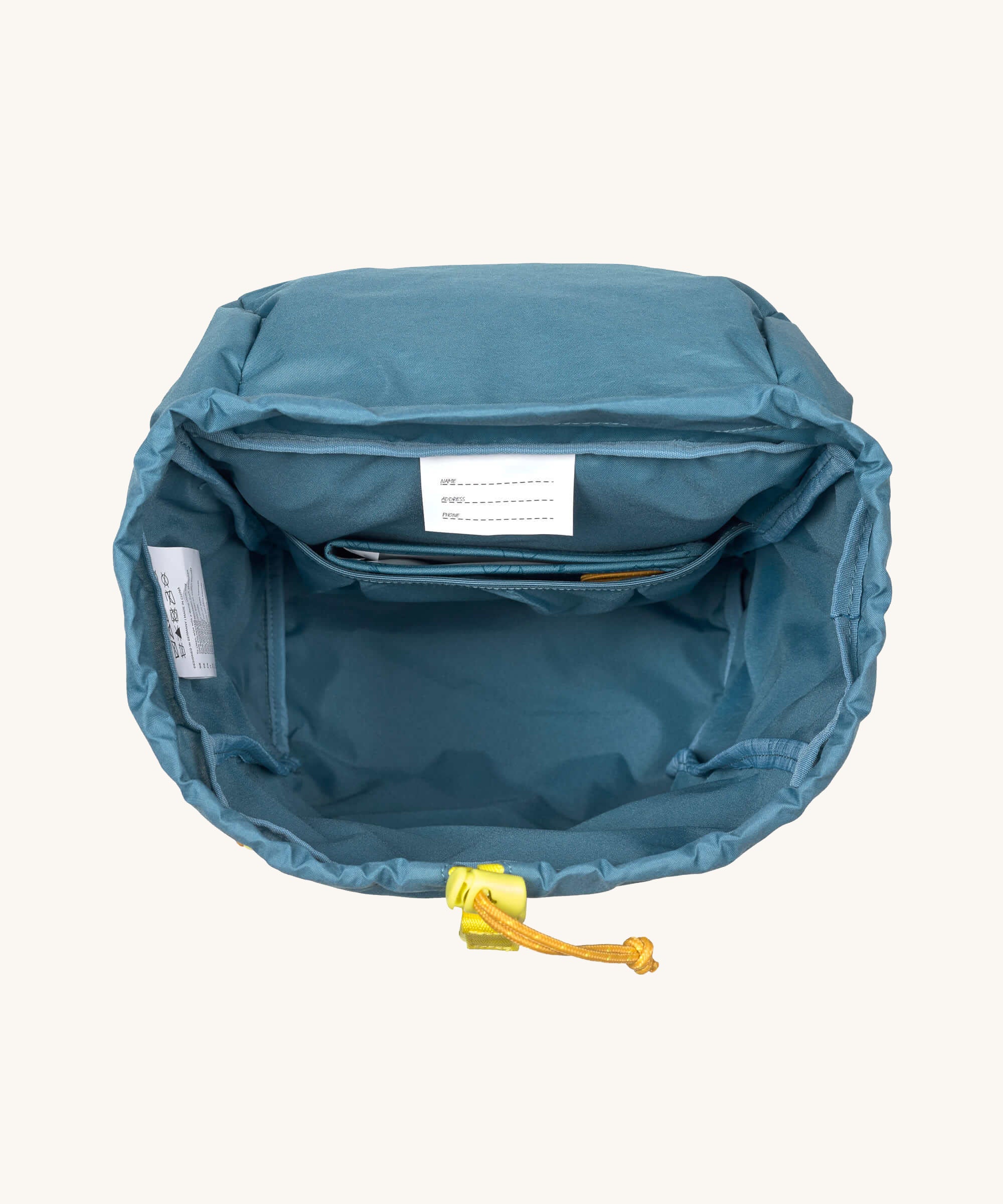 The interior of the Lassig kids big outdoor backpack in Adventure Blue. These children's backpacks are part of a wide range available at Babipur.