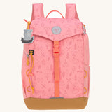 Lassig Kids Big Outdoor Backpack with an Adventure rose pink design. The print features tents, trees, and clouds, and a pink front strap. These children's backpacks are part of a wide range available at Babipur.