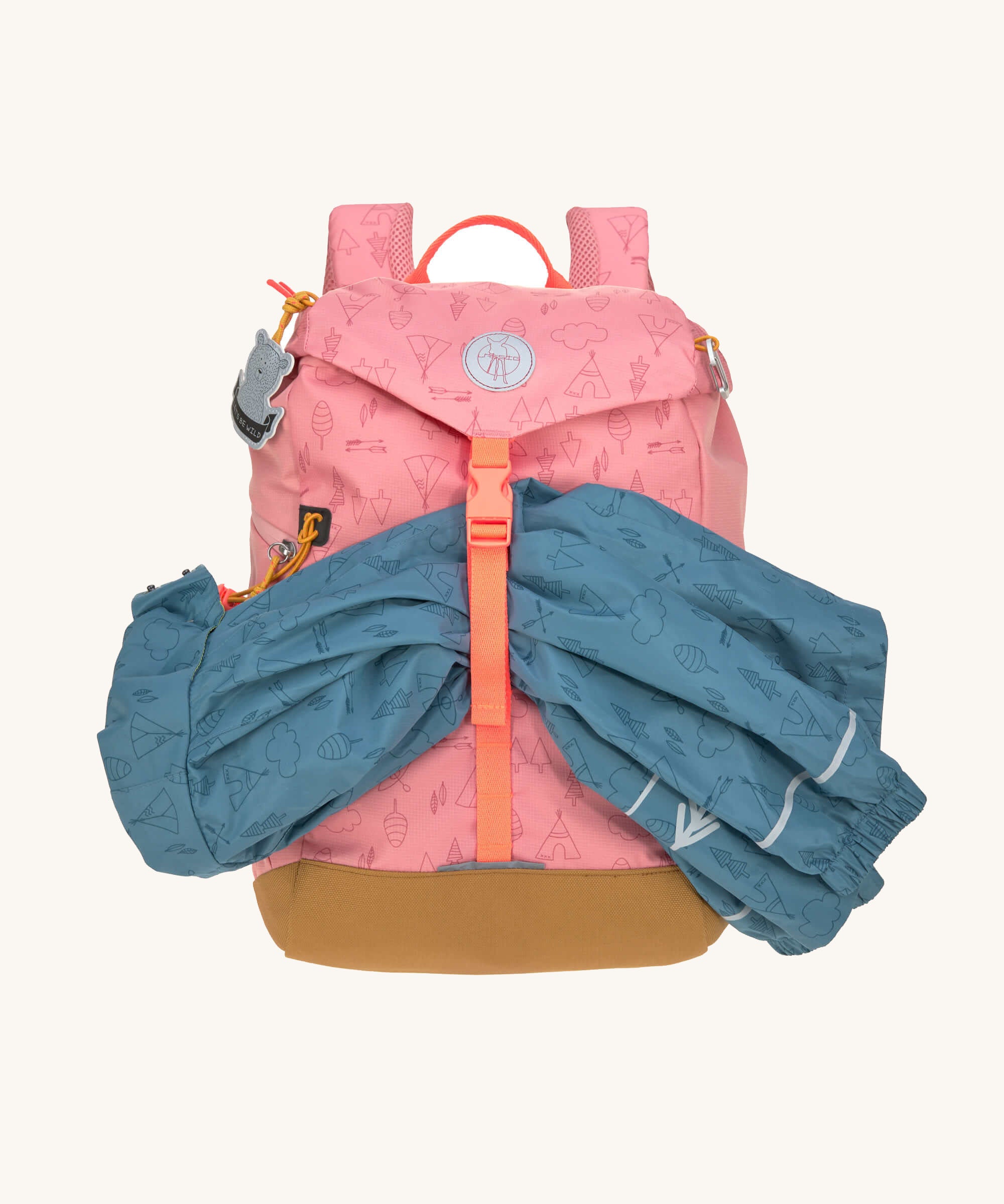 The Lassig kids big outdoor backpack in Adventure rose, with a coat secured under the front strap. These children's backpacks are part of a wide range available at Babipur.