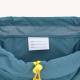 A close up of the name tag inside the  Lassig Kids Big Outdoor Backpack.