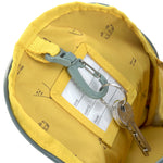 The inside of the Lassig kids mini adventure backpack, with a handy hook to keep keys attached safe. 