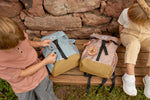 Two kids with their Lassig mini outdoor backpacks.