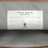 A close up of the name tags inside the Lassig Mini Rolltop Backpack in a Nature Hazelnut colour. This children's bag is part of a wide range of backpacks and accessories available at Babipur. 