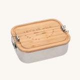 Lassig Stainless Steel Bamboo Lunchbox with an Adventure design. The words let's be wild are written on the bamboo lid. This children's divided lunchbox is part of a wide range of food storage solutions available at Babipur.