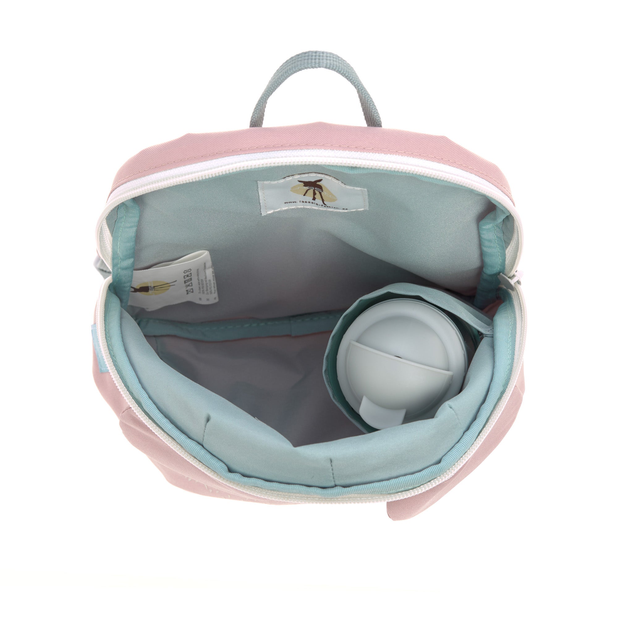 The inside of the Lassig 'About Friends' tiny backpack in light pink, showing a light blue lining and a water bottle inside. 