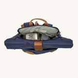 A view of the inside of the Lassig Medium Rolltop Backpack in a Little Gang Navy colour design. These roll top bags are available in different colours and sizes at Babipur.