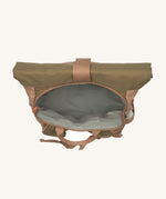 A view of the top of the Lassig Mini Rolltop Backpack in a Nature Hazelnut colour showing inside the zipped section. This children's bag is part of a wide range of backpacks and accessories available at Babipur. 