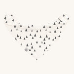 The Lassig organic cotton bandana dribble bib, in white with little grey triangles printed all over. It has white popper fastenings. 