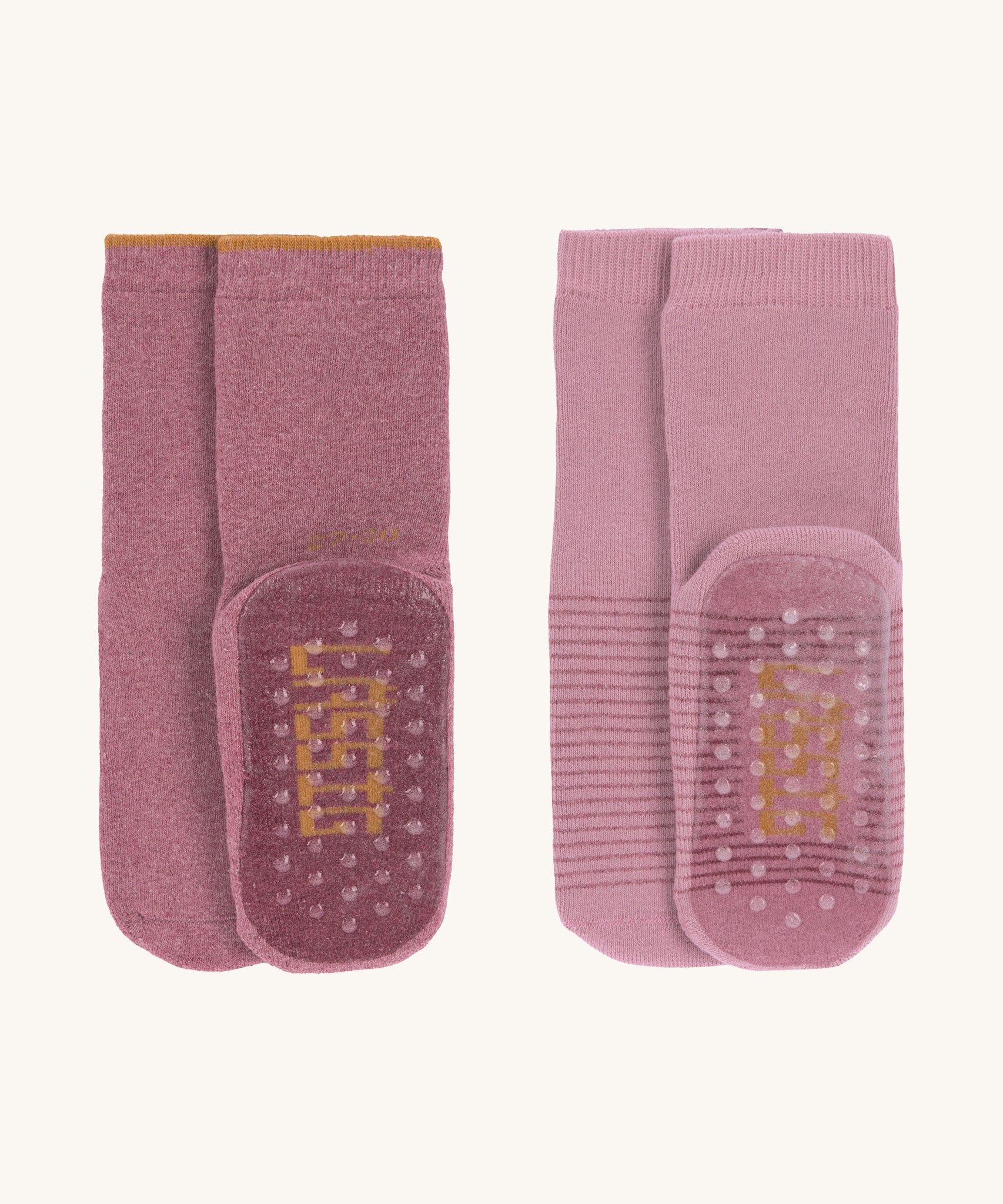 The Lassig organic cotton baby and toddler anti-slip grippy socks 2-pack in pink shades.