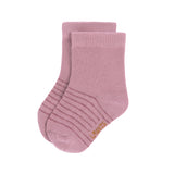 The Lassig organic cotton baby socks in a light pink with darker pink stripes.