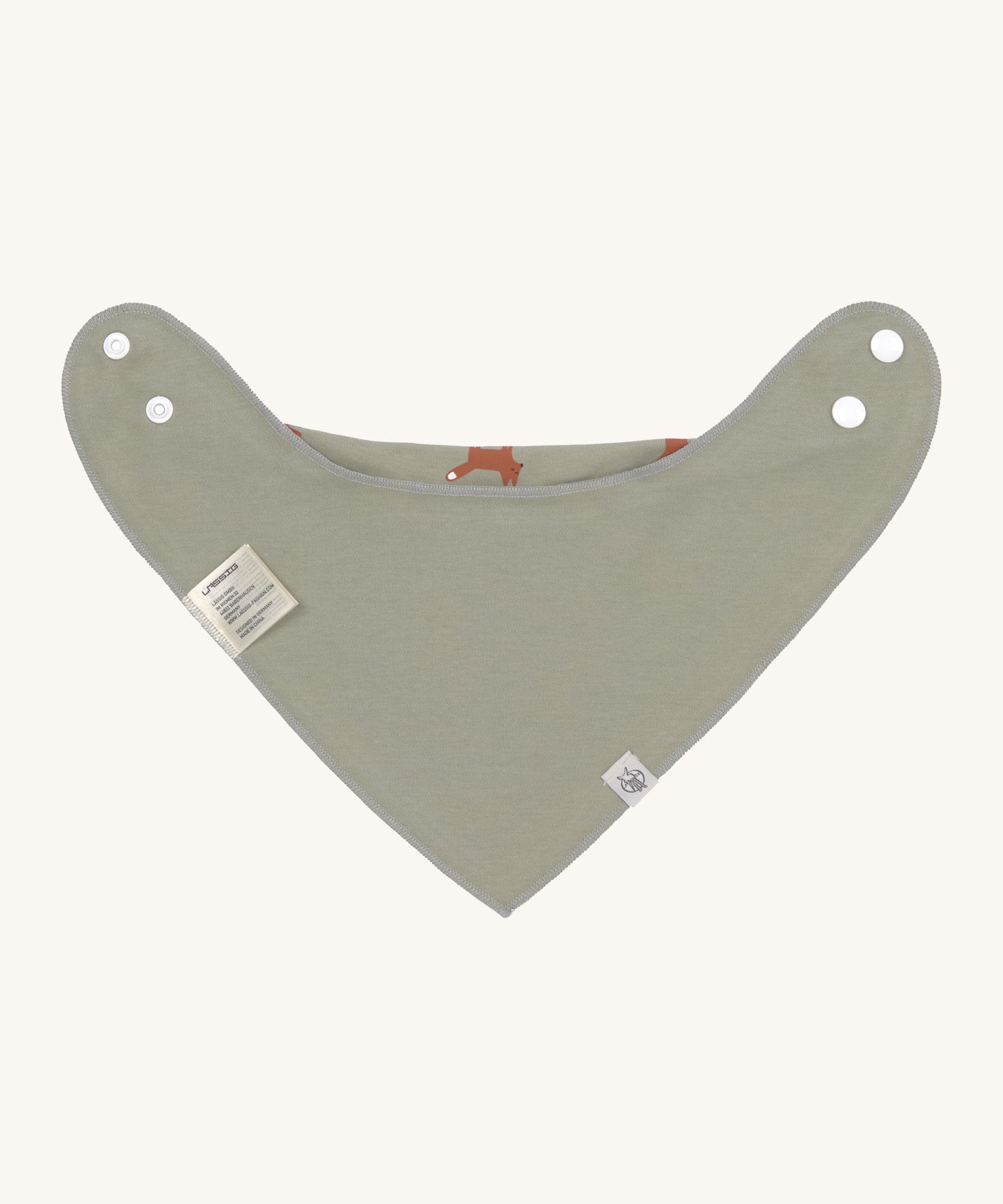 The back of the Lassig Little Fox organic bandana bib, in a plain soft green colour. 