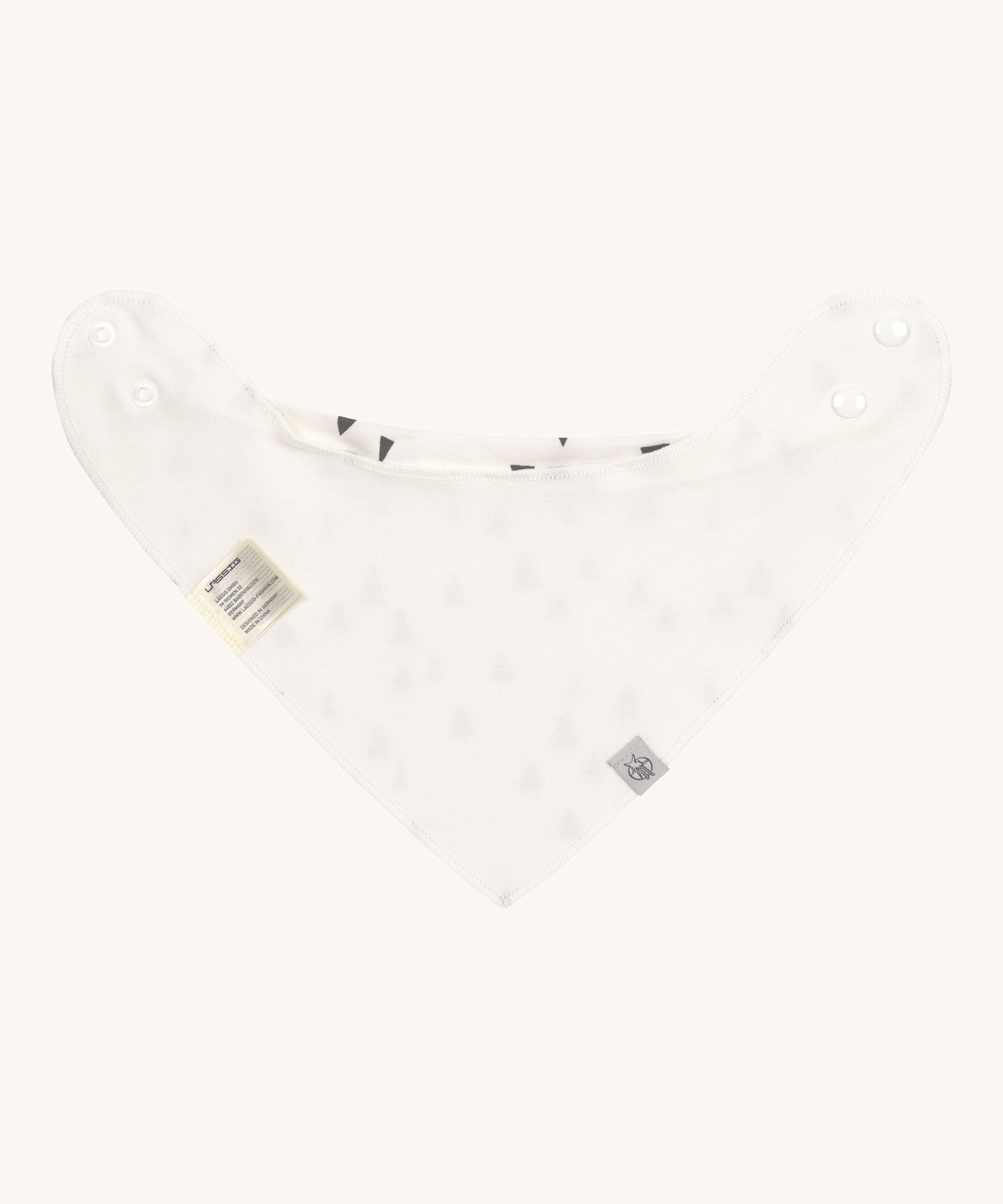 The back of the Lassig Little Fox organic bandana bib, in a plain soft white colour. 